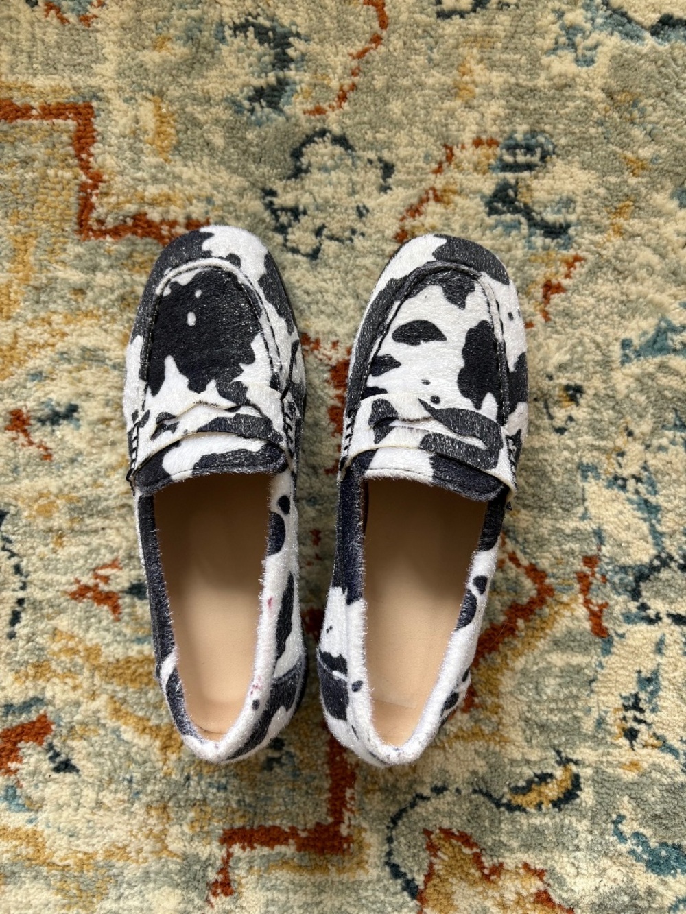 Cow print loafers